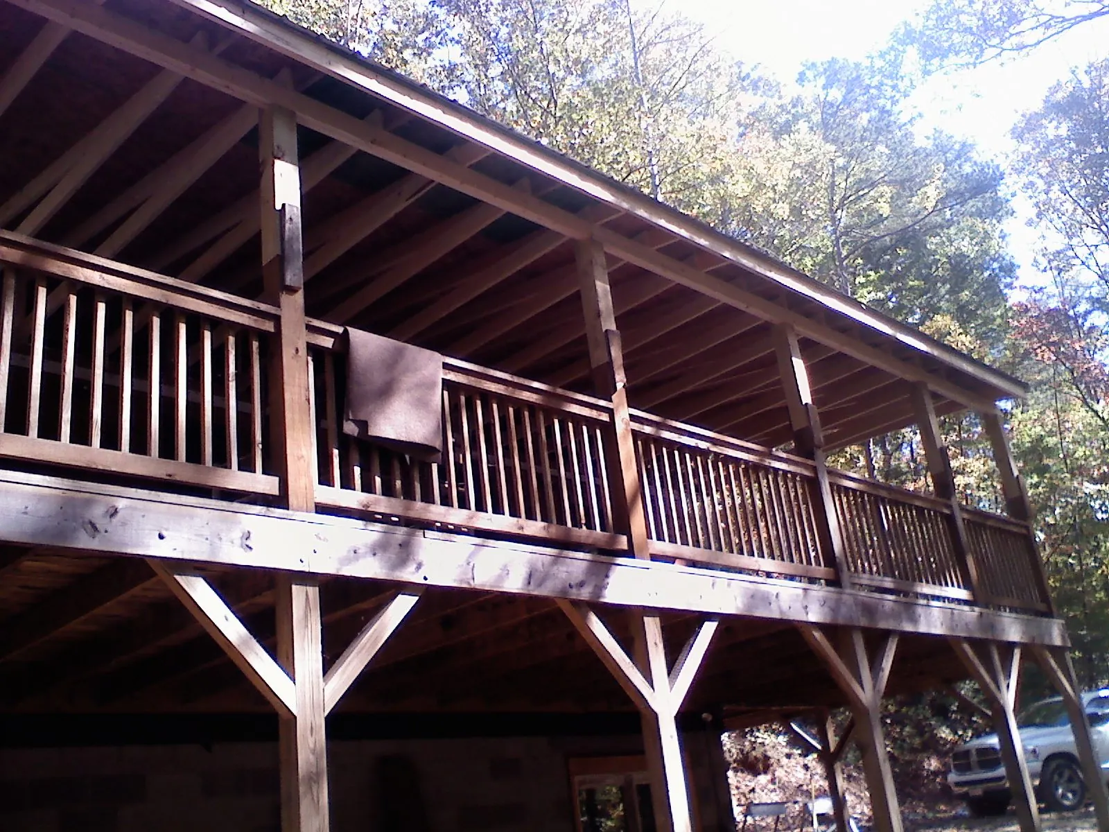 Timber framing under a new elevated porch and deck — Roof Leak Repair in Conesville by Roofing Brothers
